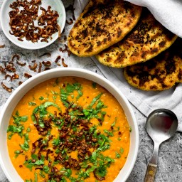 TOMATO & COCONUT DAL WITH CRISPY SHALLOTS & BLACK ZA’ATAR NAAN BREADS